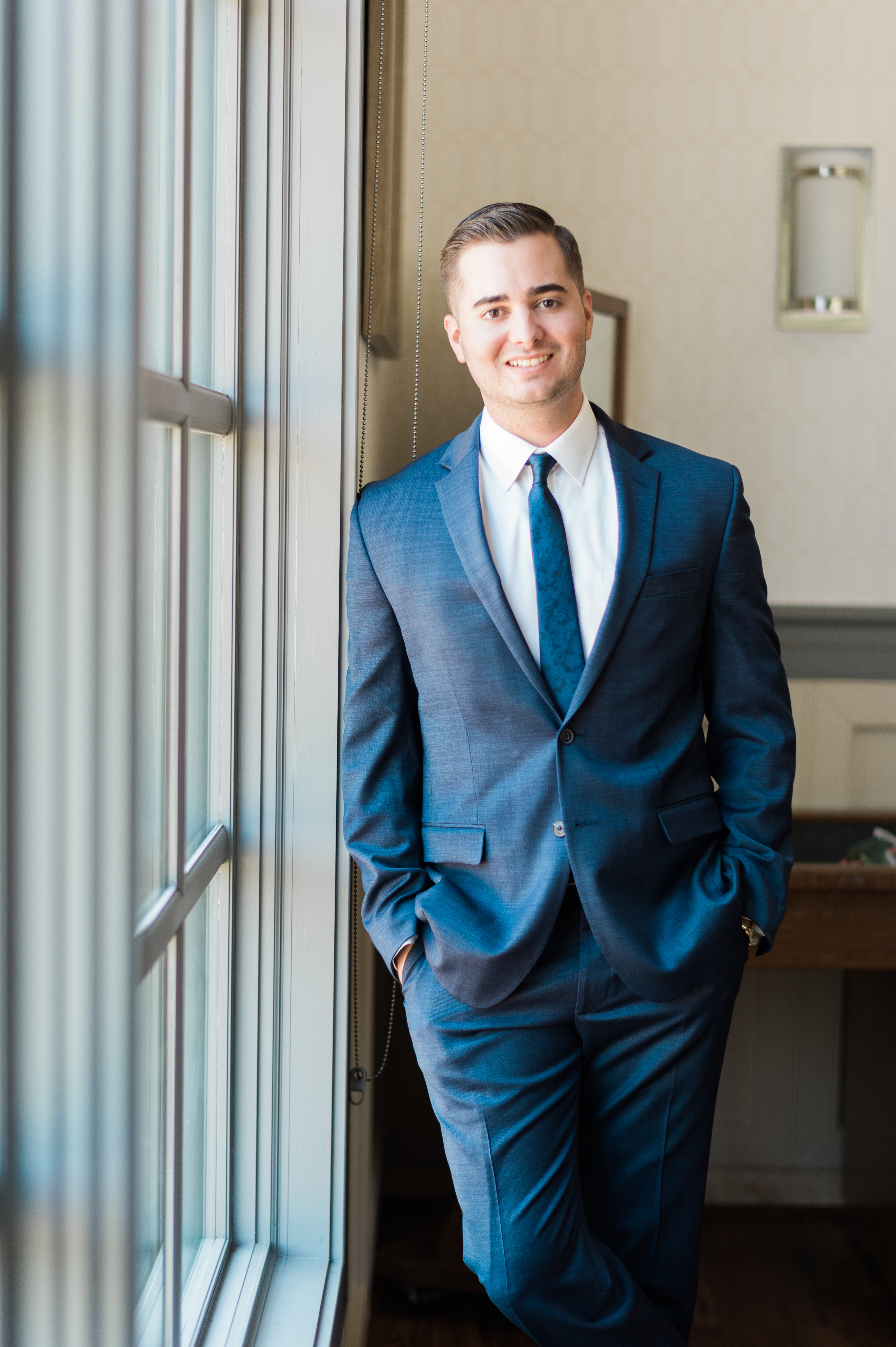 Groom Attire: Navy Suit & Tie